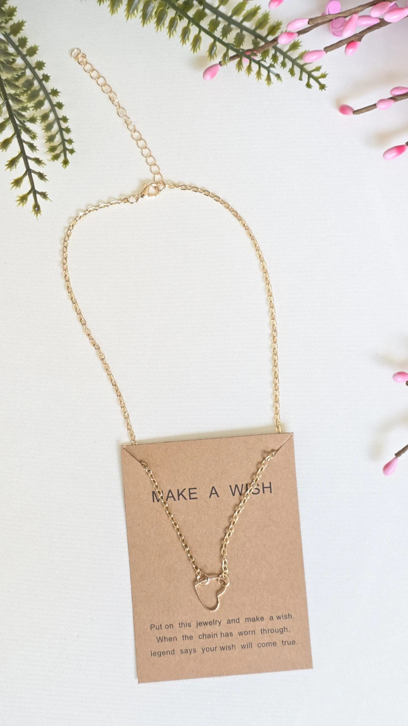 Gold coloured necklace with heart charm - photo 2