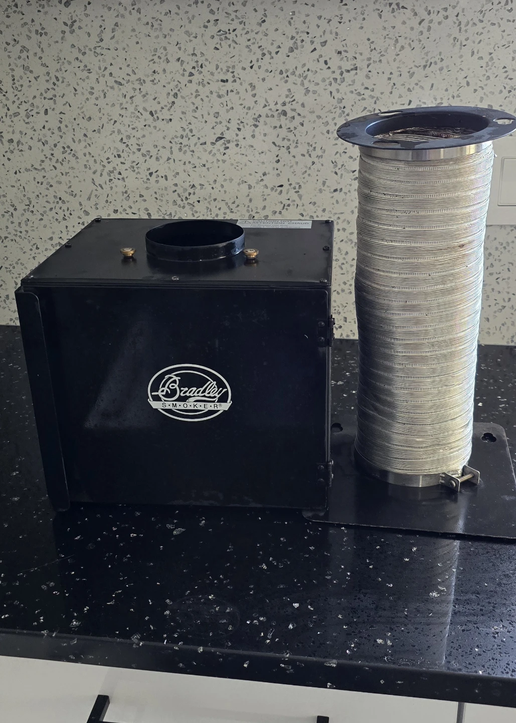 Bradley Smoker cold smoke adaptor.