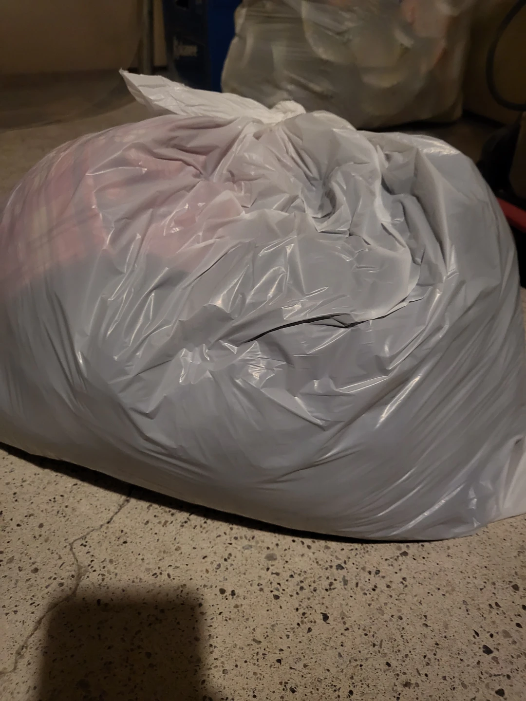 bag of assorted woman's clothes