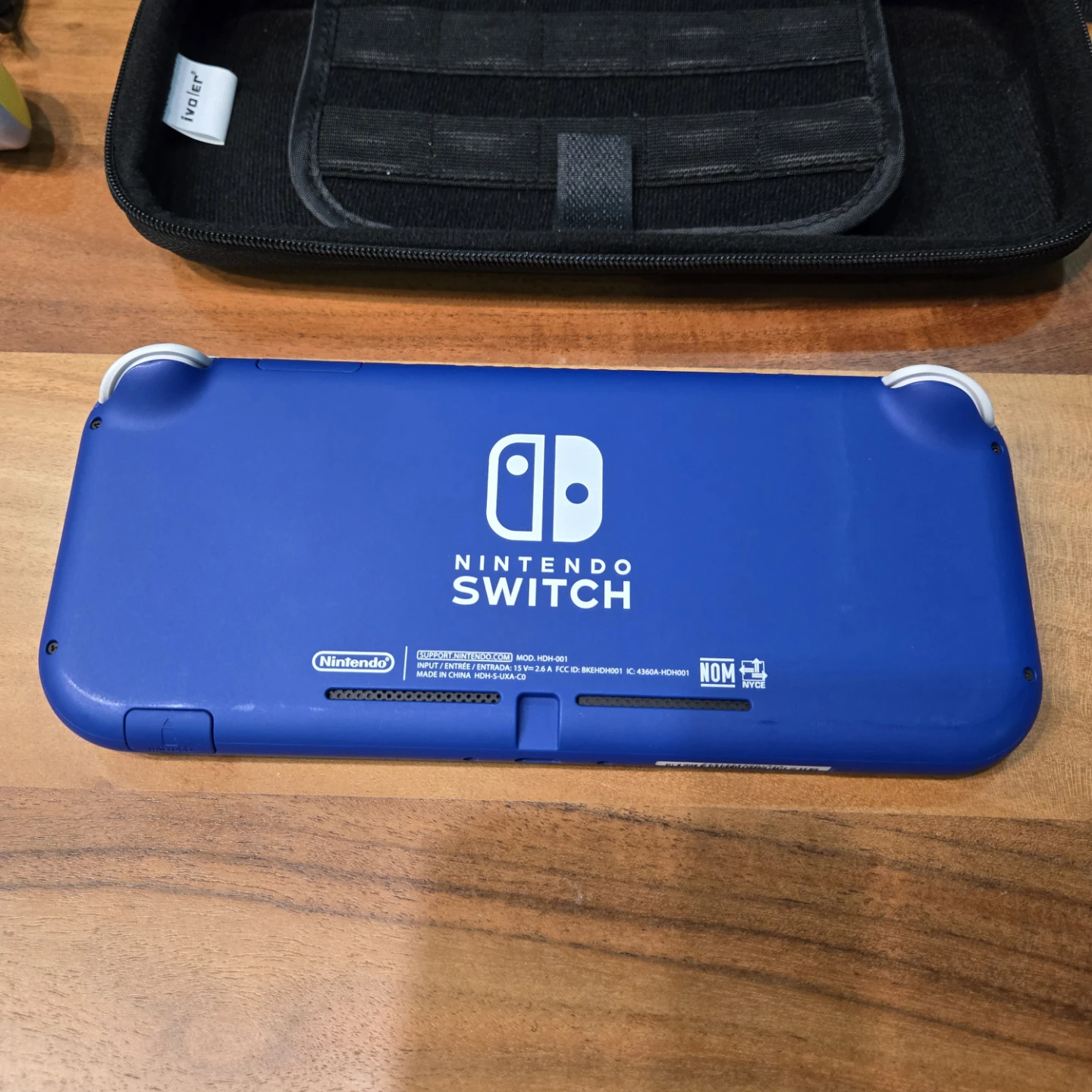 Nintendo Switch Lite. Original charger, case, grip, sd card. - photo 3