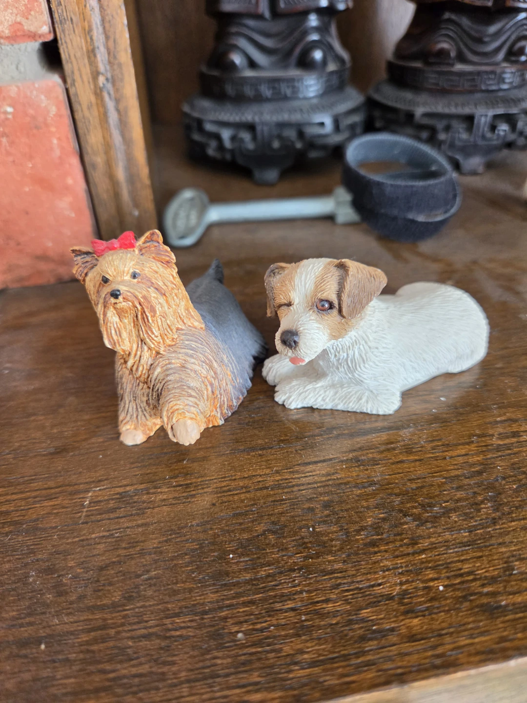 Two small dog figurines