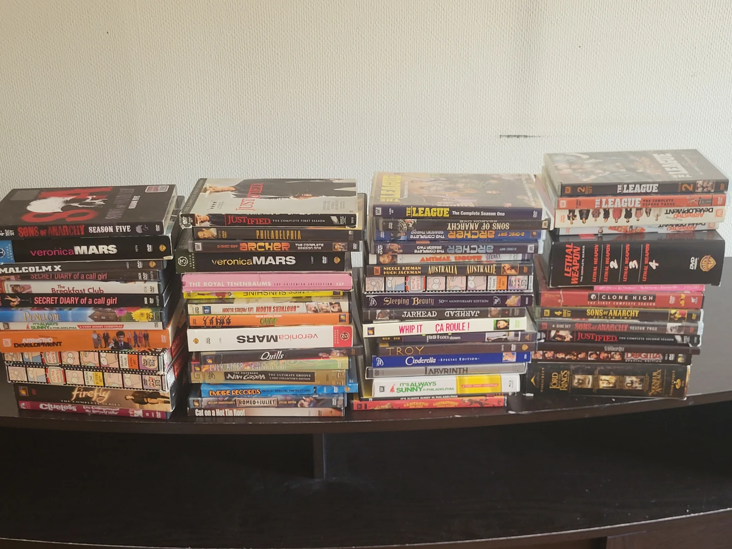 Collection of DVDs: Sons of Anarchy, Veronica Mars, and more