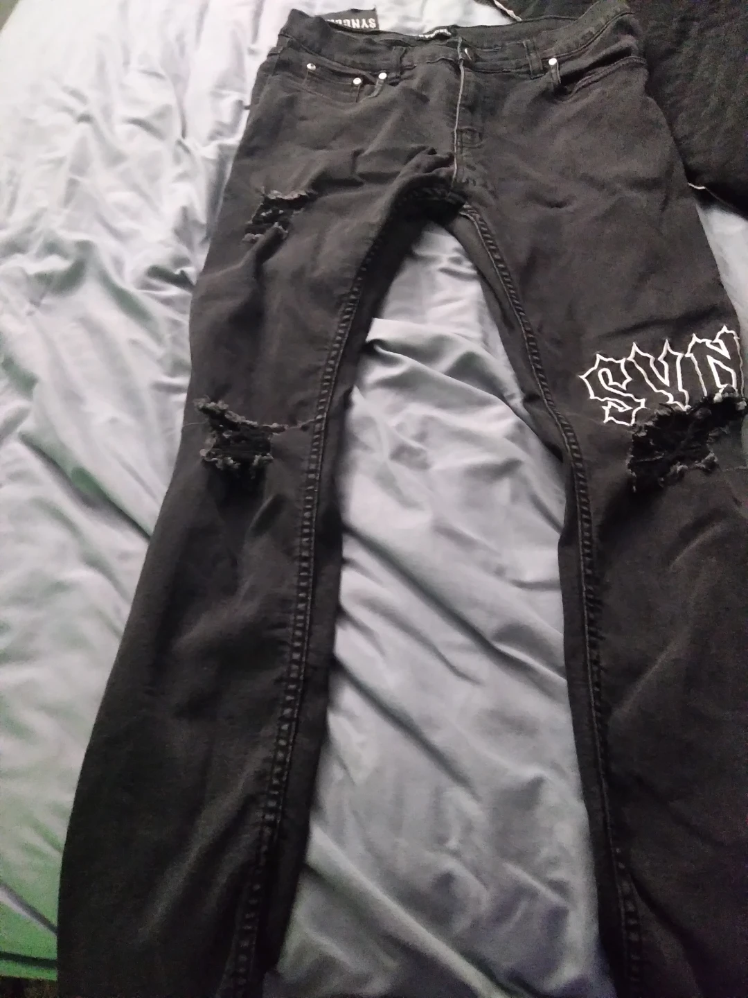 SYN black ripped jeans