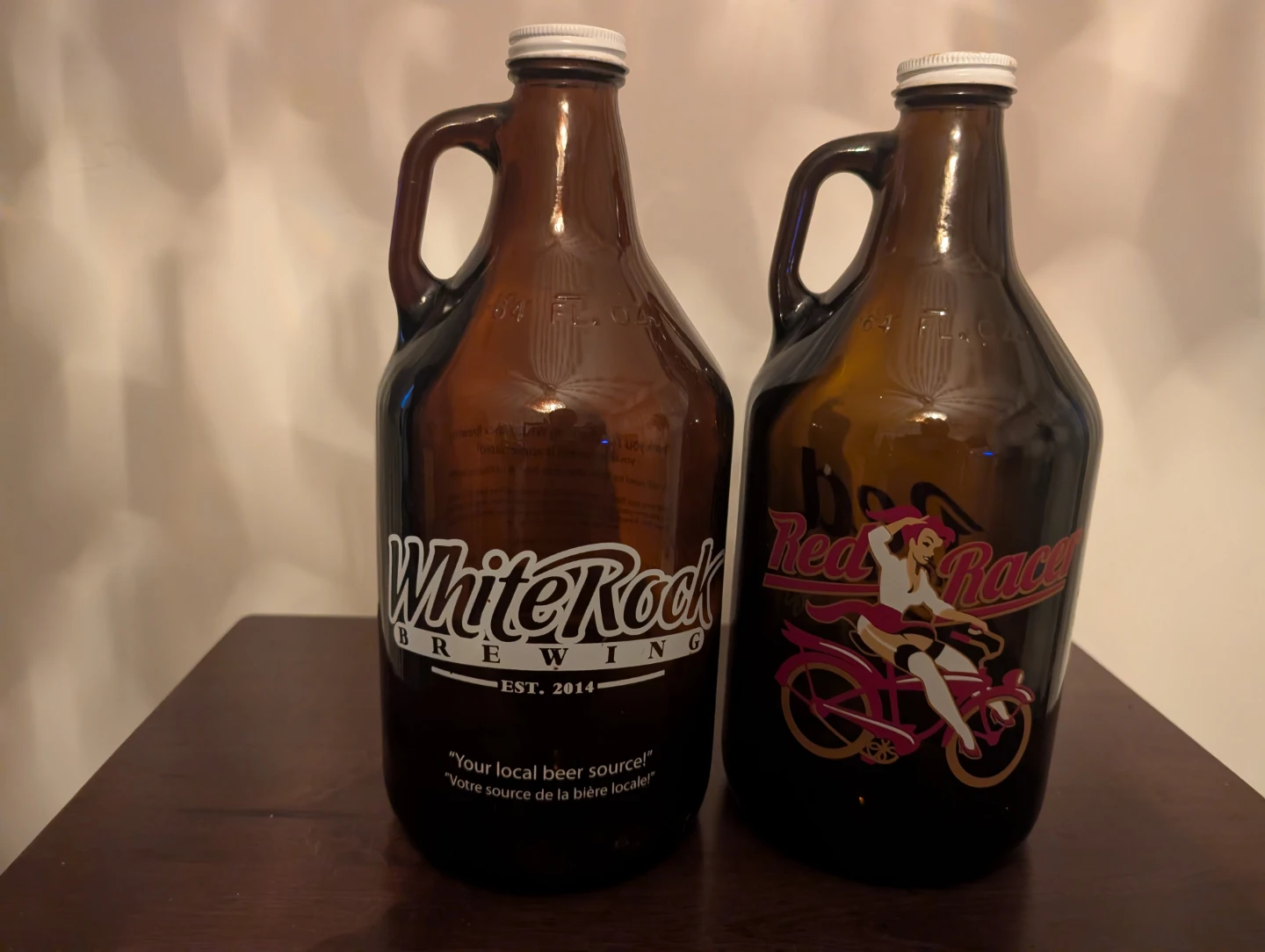 2 - 64 oz White Rock Brewing & Red Racer Growlers