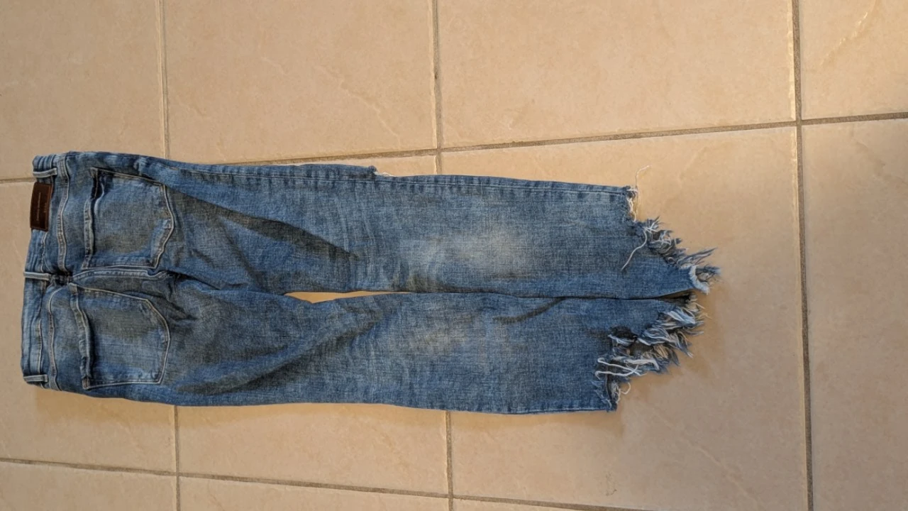 Zara Distressed Mid-Wash Jeans with Raw Frayed Hem - photo 2