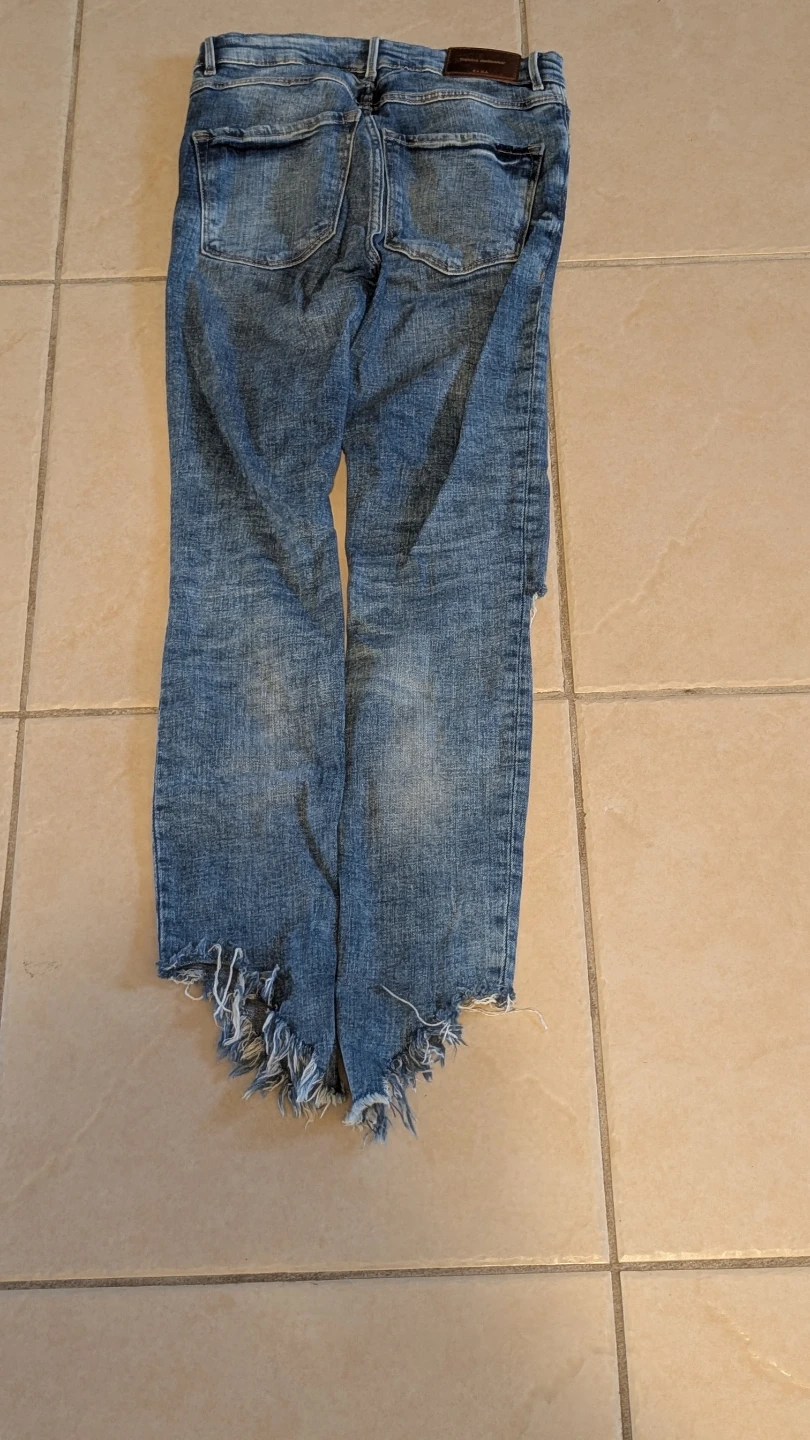 Zara Distressed Mid-Wash Jeans with Raw Frayed Hem - photo 4