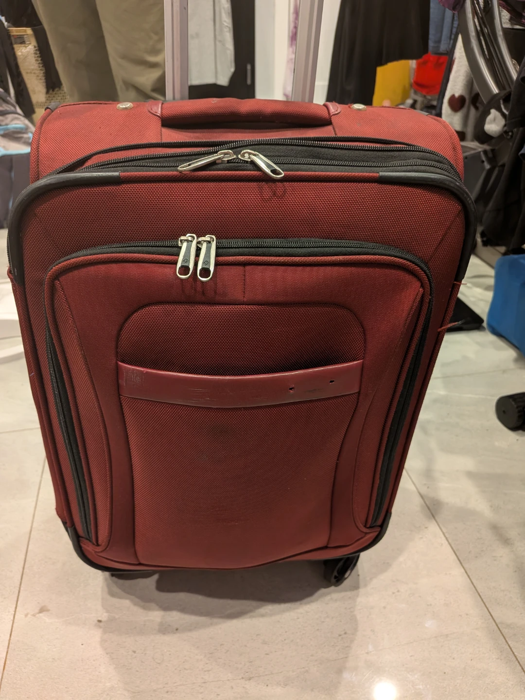 Samsonite 22" carry on  Red Rolling Suitcase