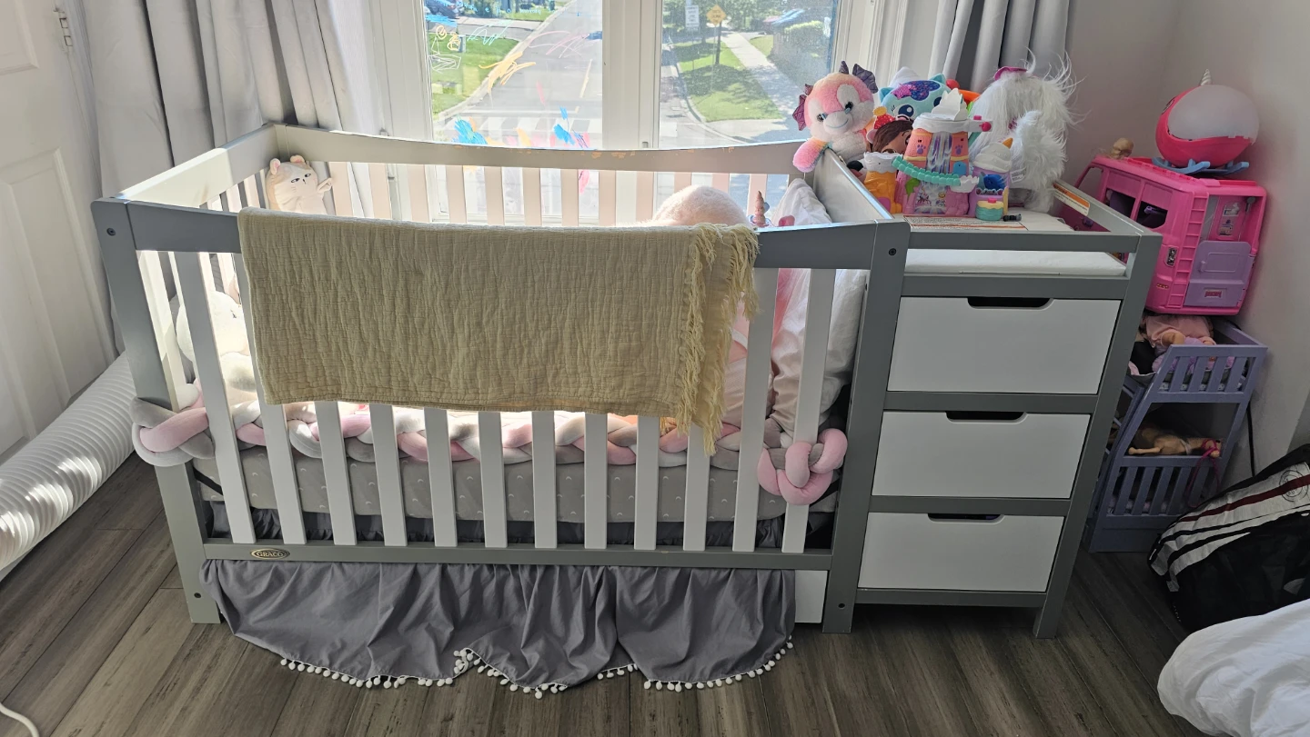 White Convertible Crib with Attached Changing Station