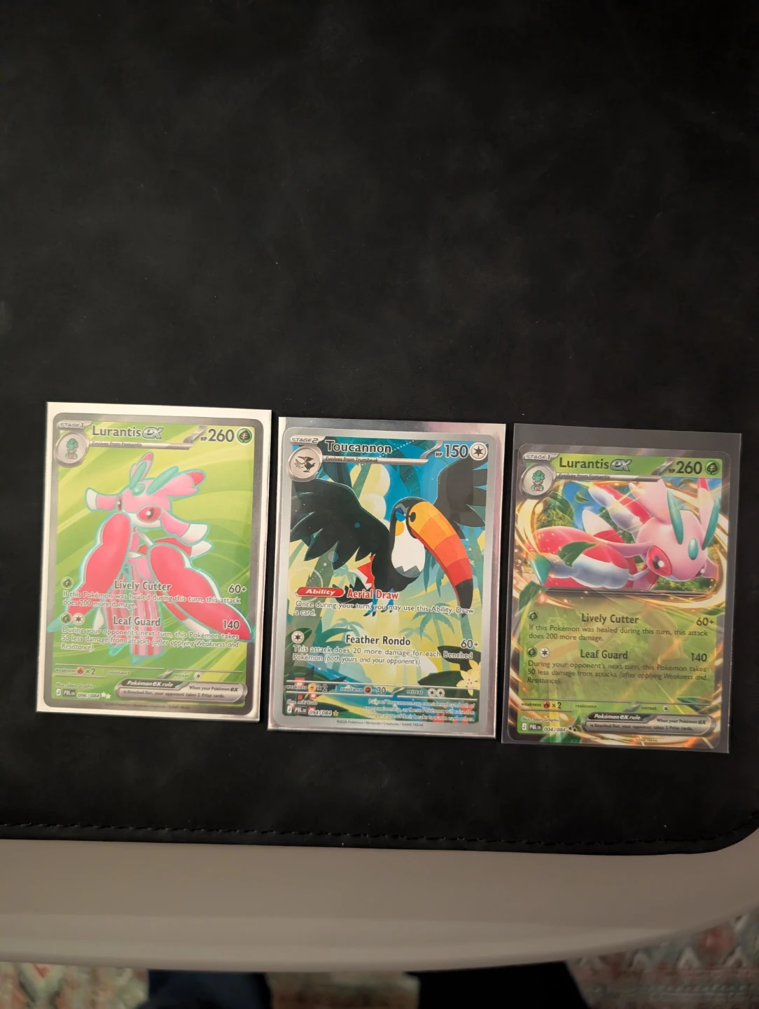 Cynthia's Spiritomb, Mega Elektross EX, Lurantis GX, Toucannon