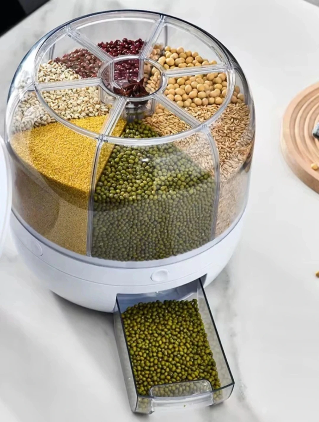Rotating grain dispenser box