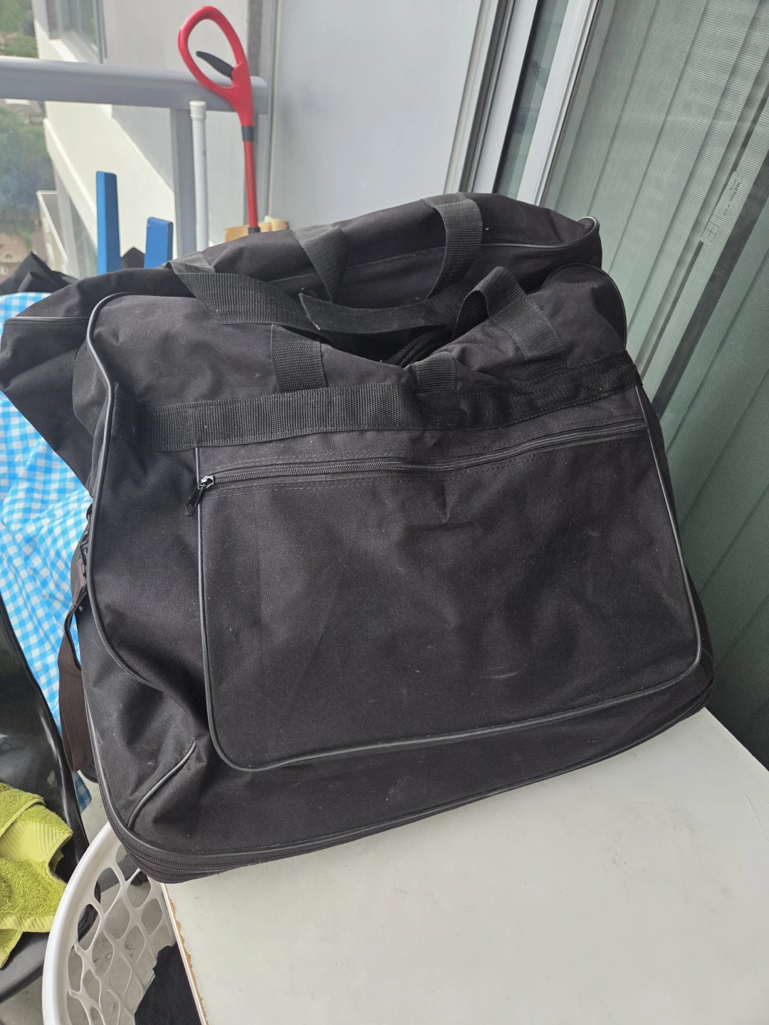 Black Rolling Duffel Bag