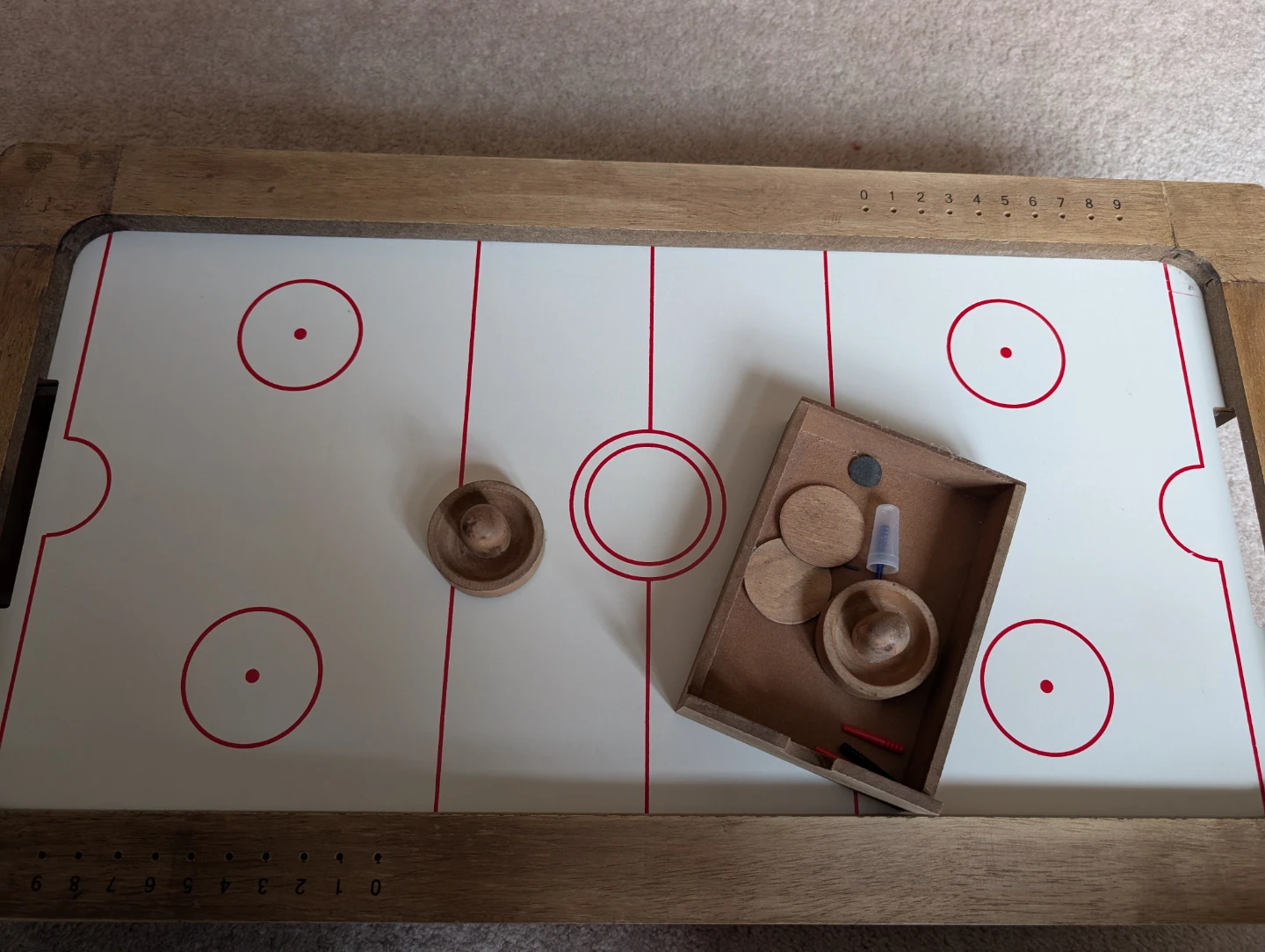 Table top wooden air hockey