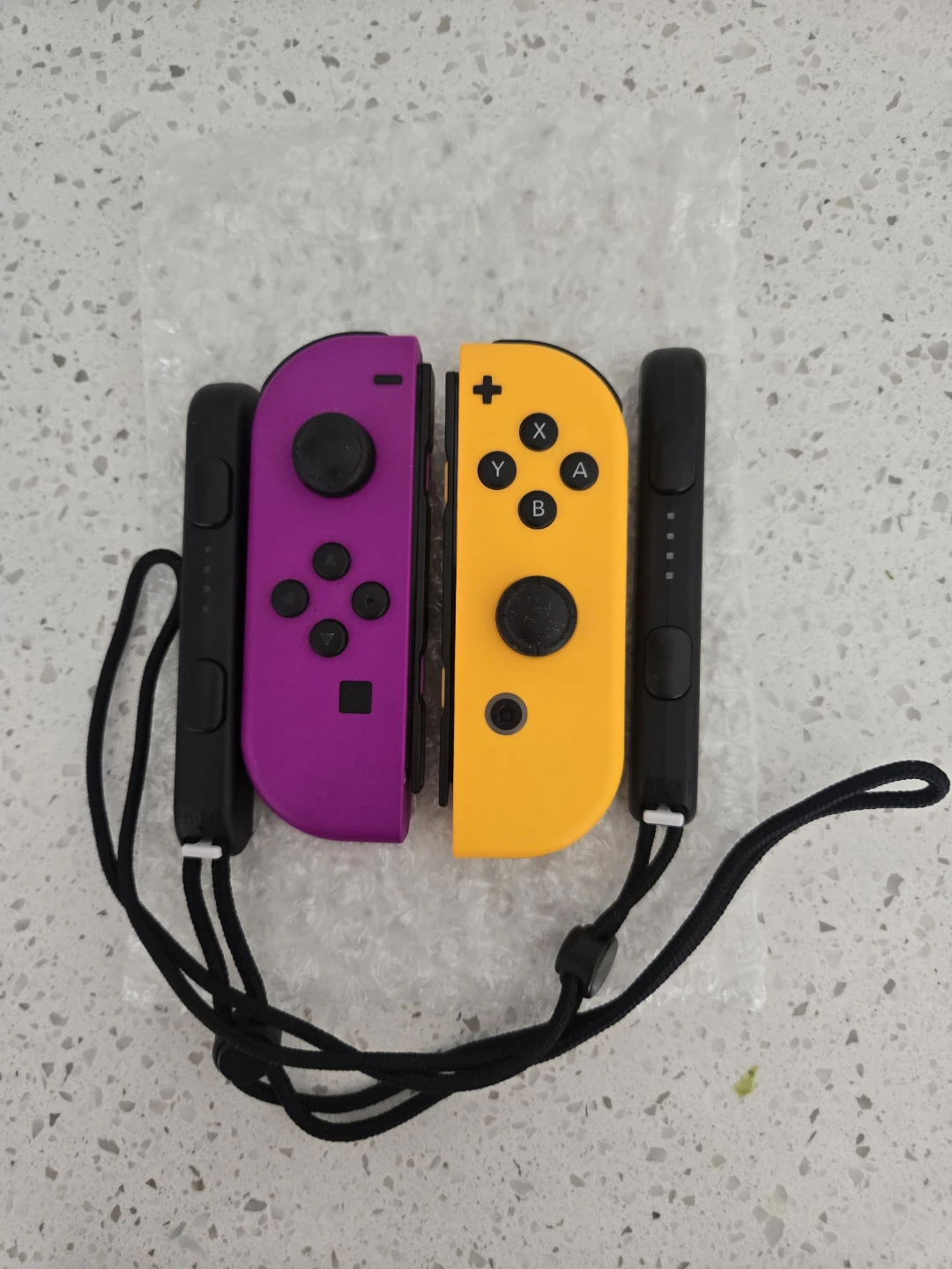 Nintendo Switch Joy-Con Controllers (Purple & Yellow)
