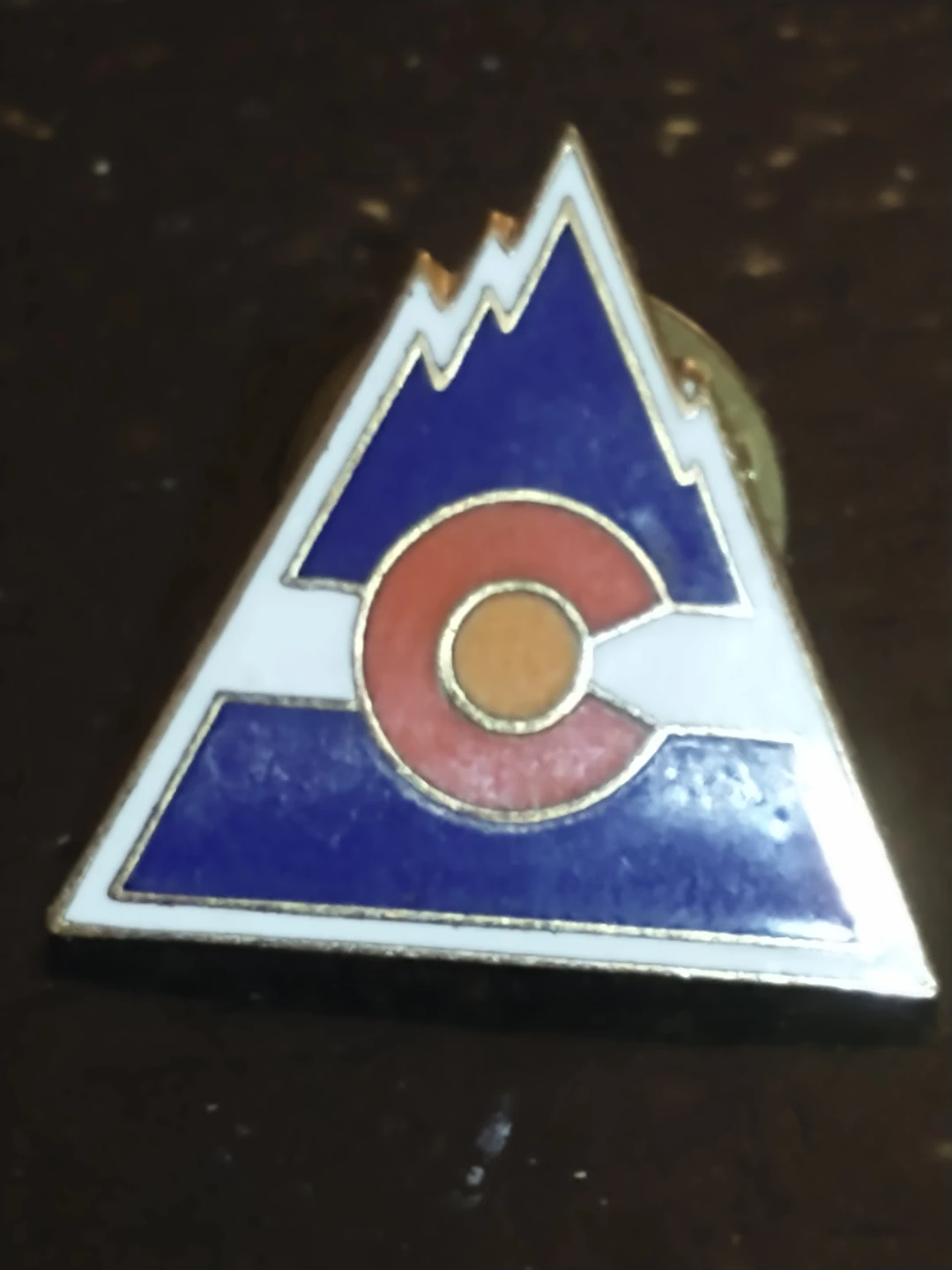 Lovely, 1976-1982 NHL defunct Colorado Rockies lapel pin