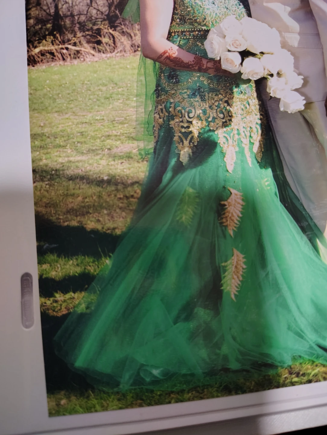 Green formal dress with gold embroidery
