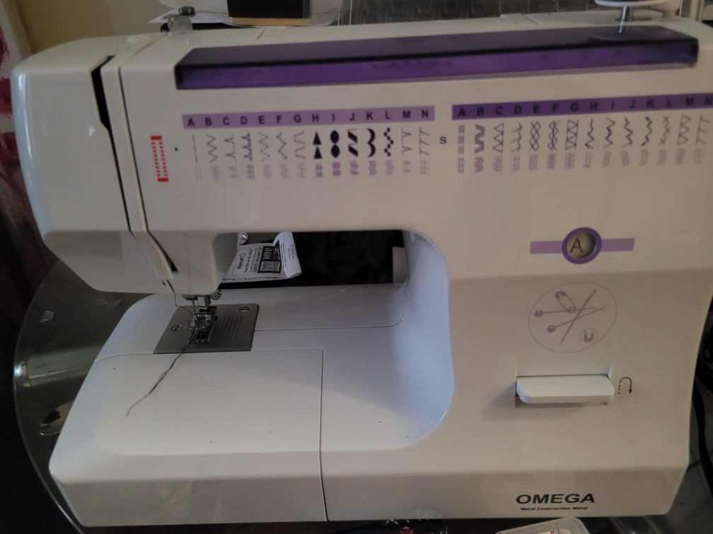 Omega Sewing Machine