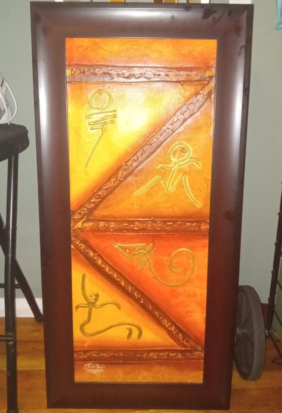Framed Wall Art with Figures and Symbols