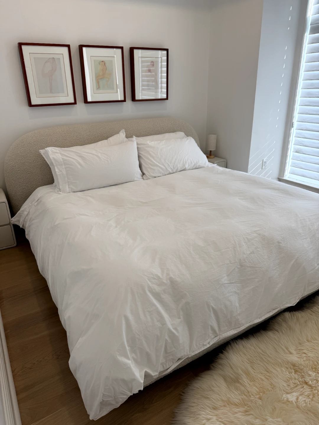 White Upholstered Bed Frame with Curved Head board king size