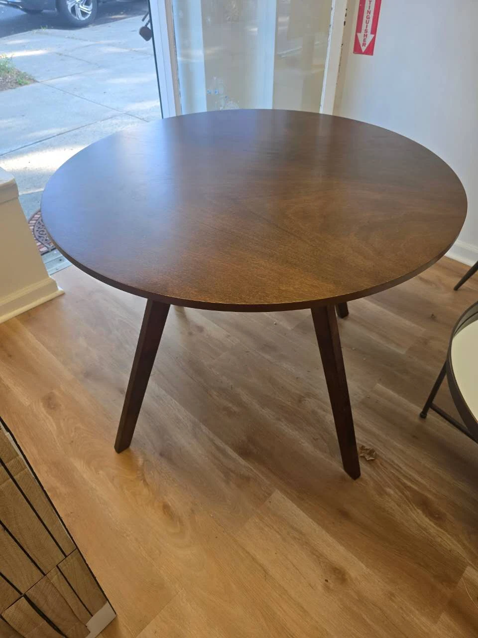 circle wood dining table. - photo 2