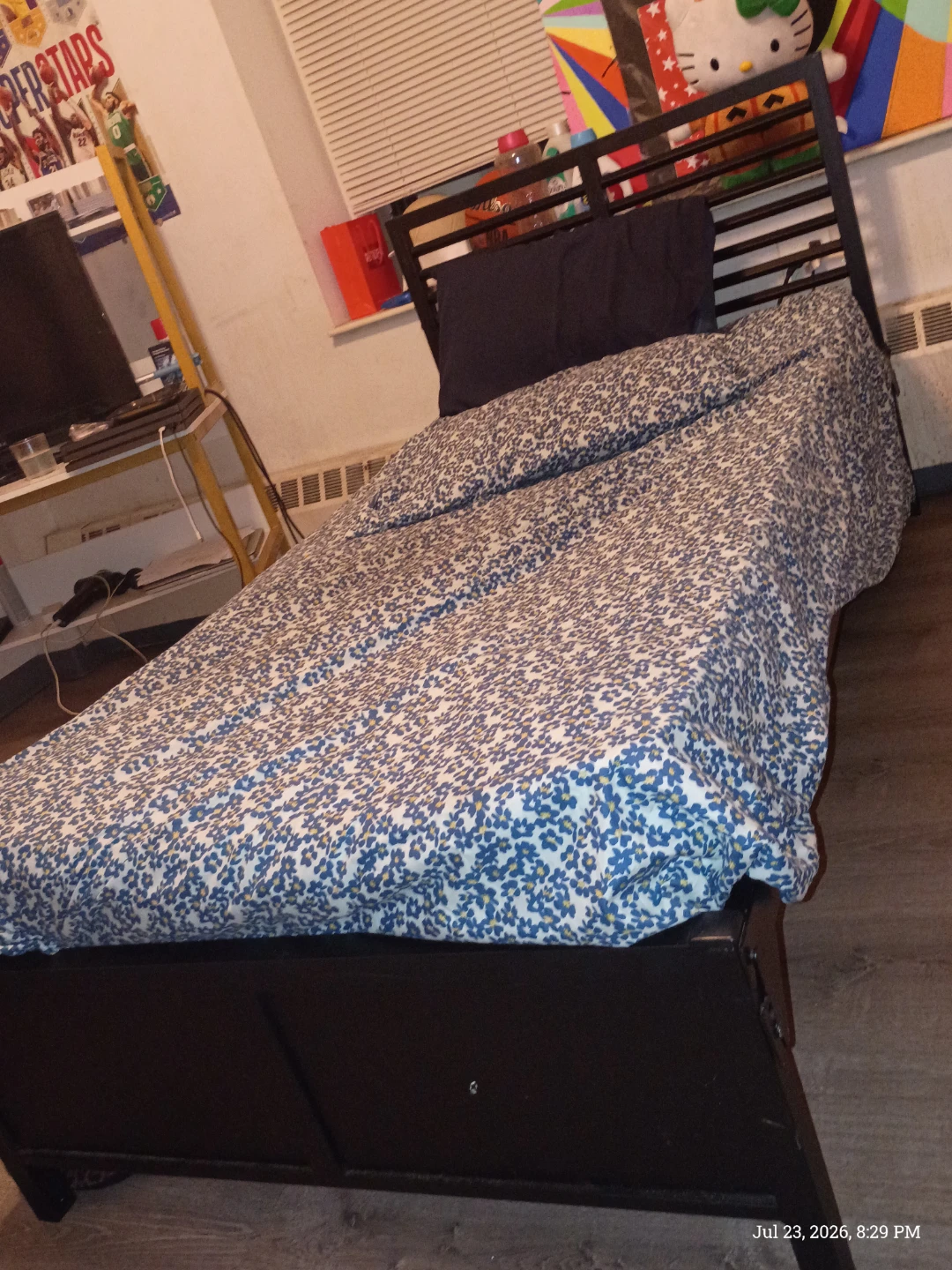 Twin Bed Frame with Blue Floral Comforter