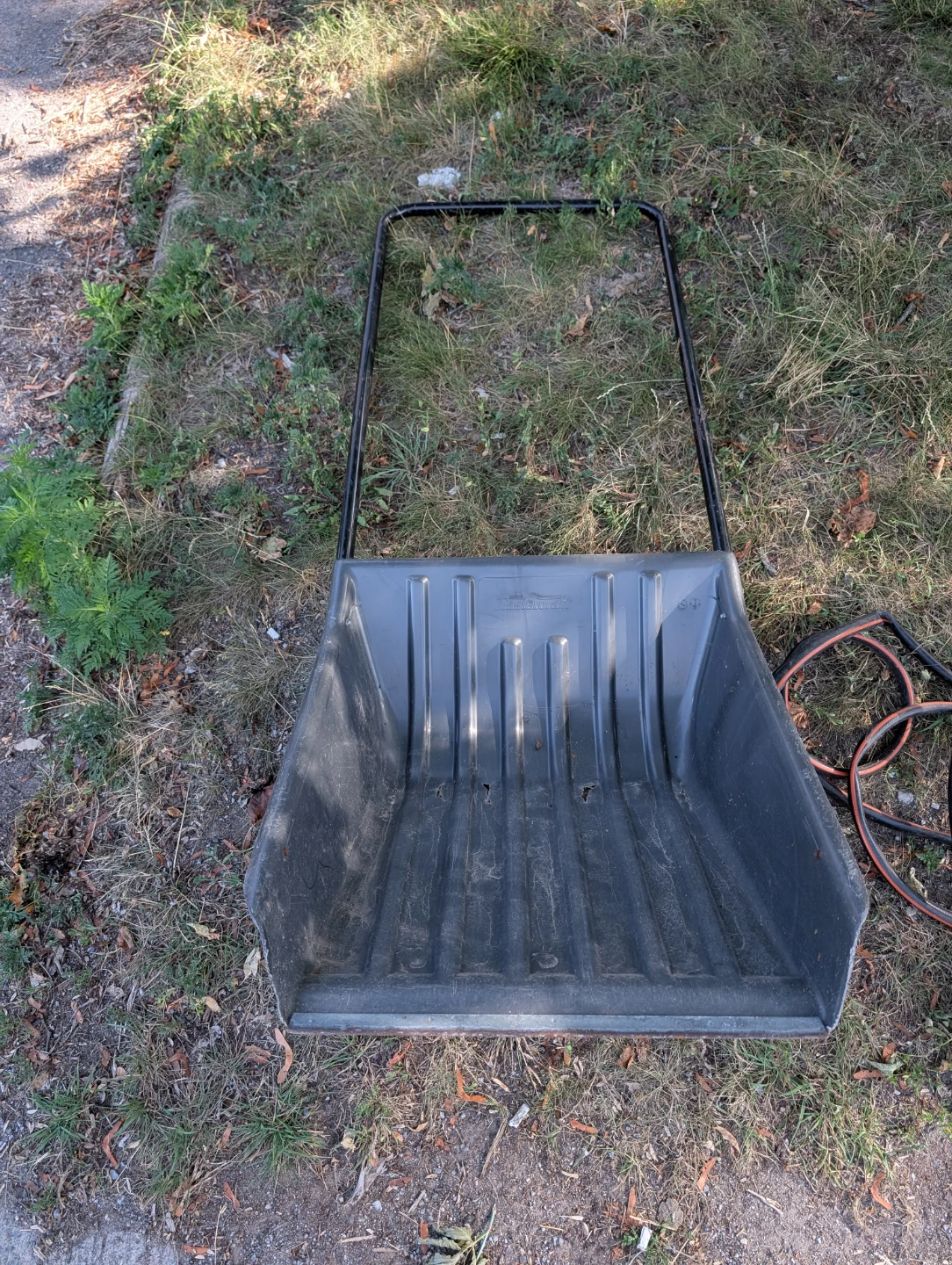 Snow shovel and garden hose