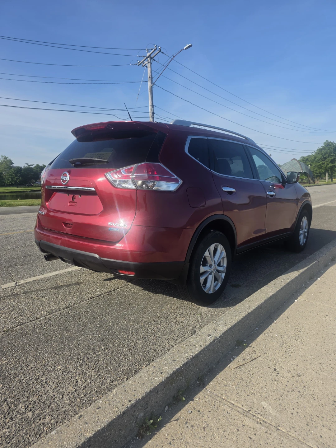 Red Nissan Rogue SV AWD - photo 3