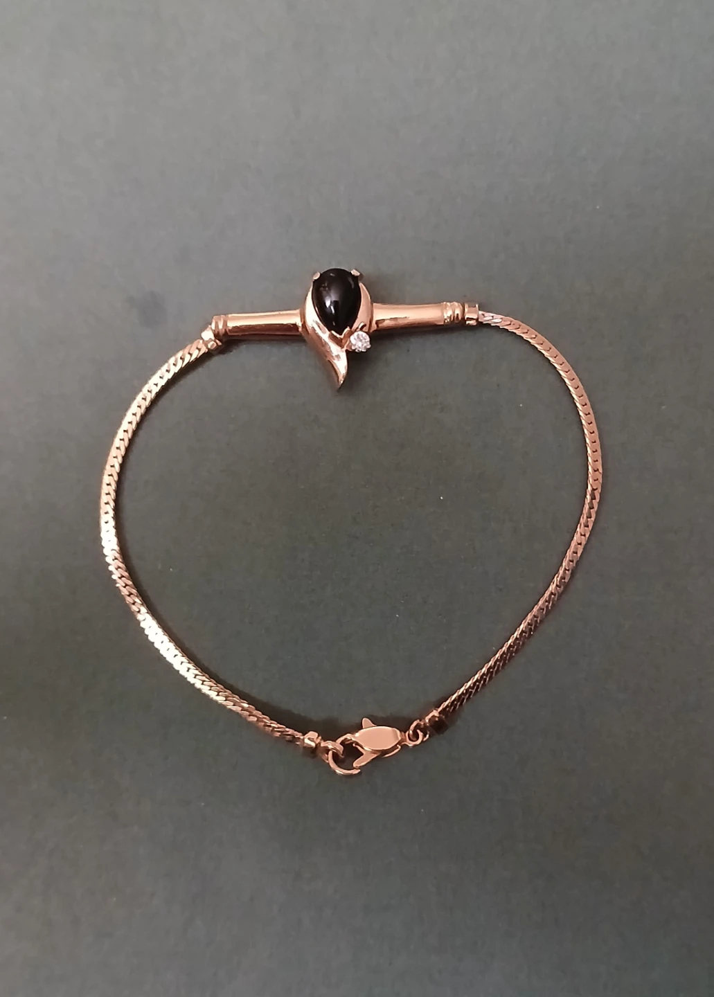 Gold-tone bracelet with black stone and diamond accent - photo 2