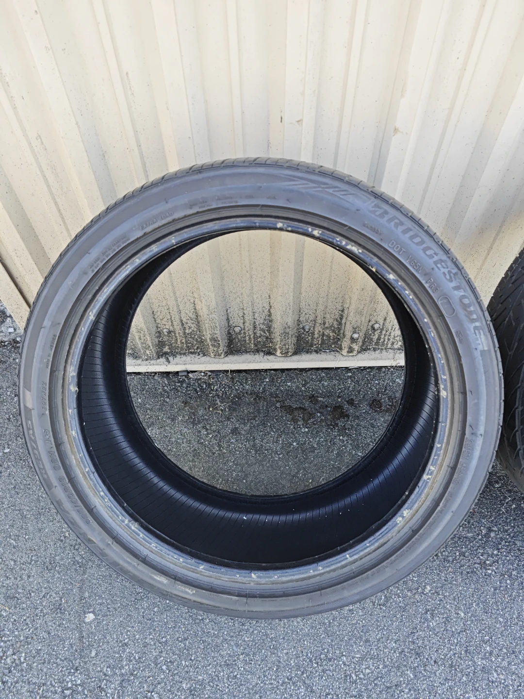 Pair of Bridgestone Potenza RE97 AS tires. 225/50R18