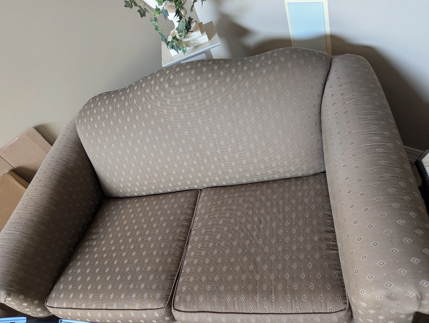 Brown patterned sofa priced each have 2 identical ones