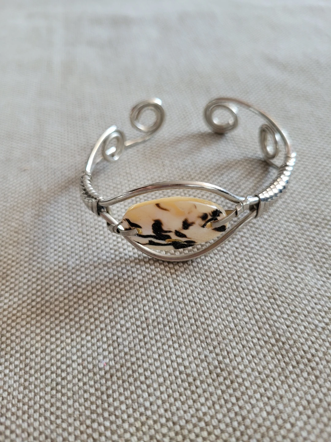 Silver-tone cuff bracelet with stone