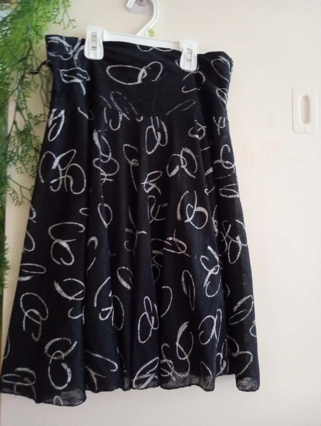 Black skirt with white swirl print