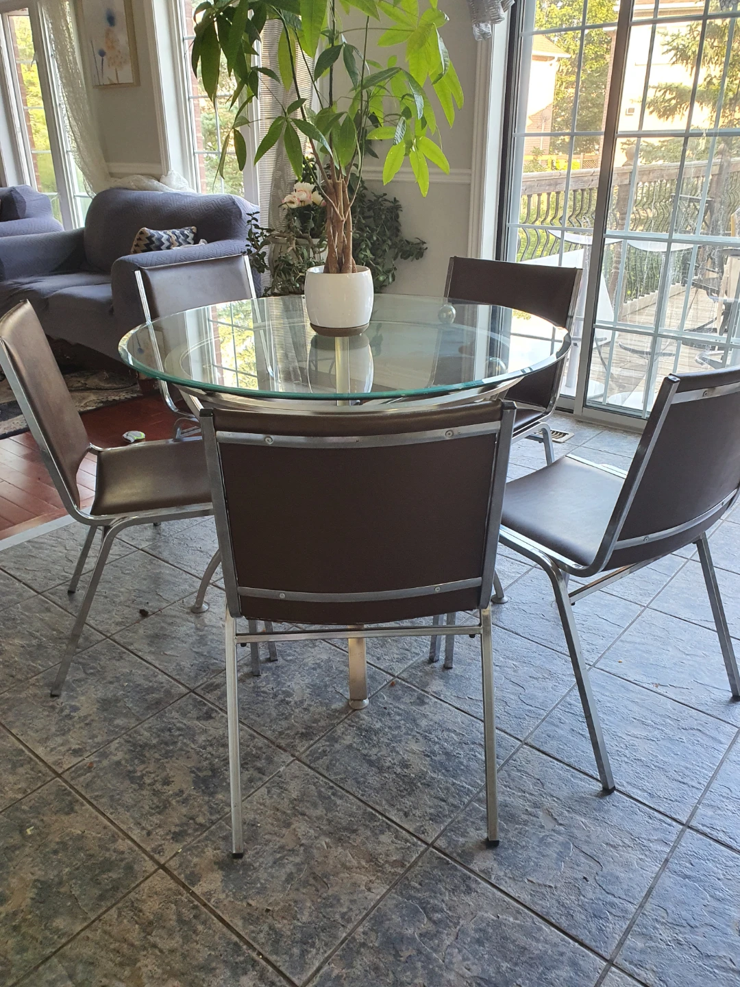Glass Dining Table with 5 Brown Chairs