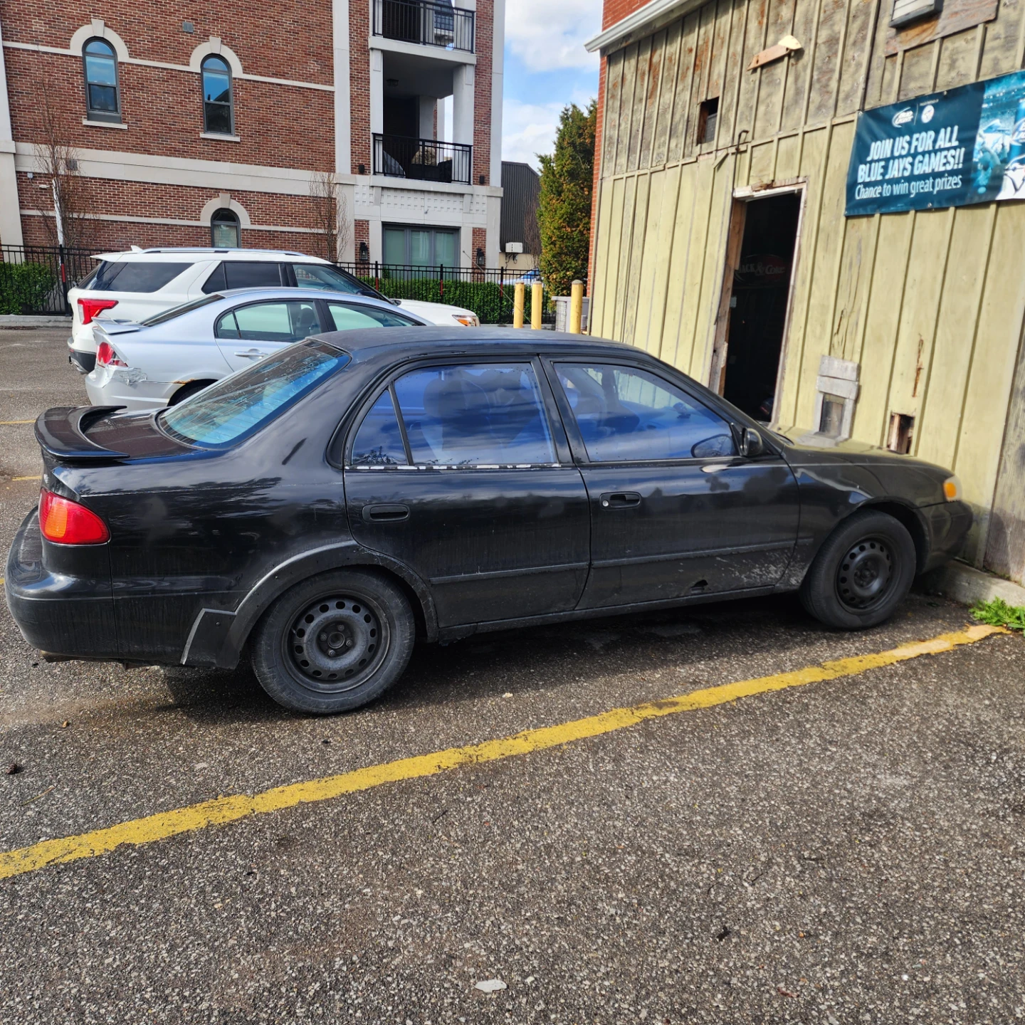 Black Toyota Corolla VE Sedan