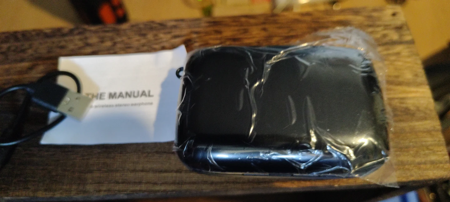 Black Wireless Stereo Earphones with Charging Case and Manual - photo 3