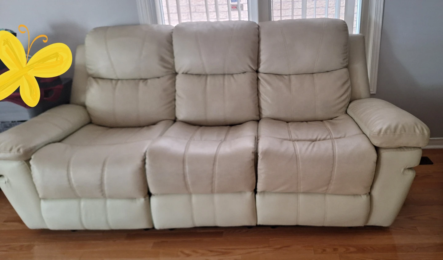 Beige Leather Reclining Sofa and Loveseat