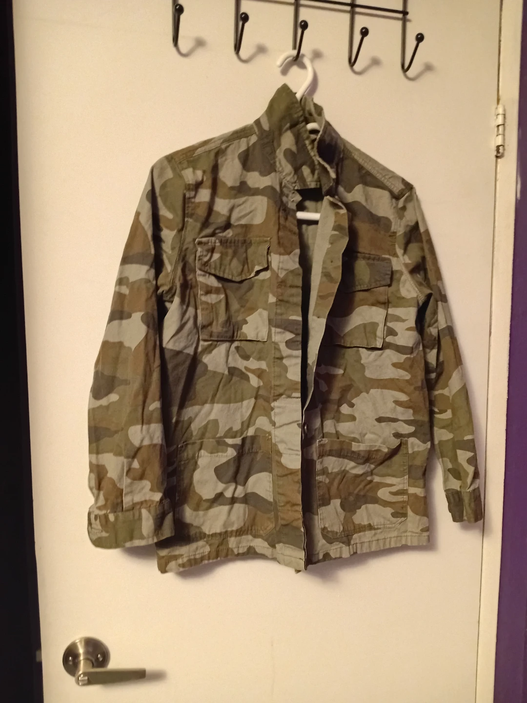Army button jacket with pockets.