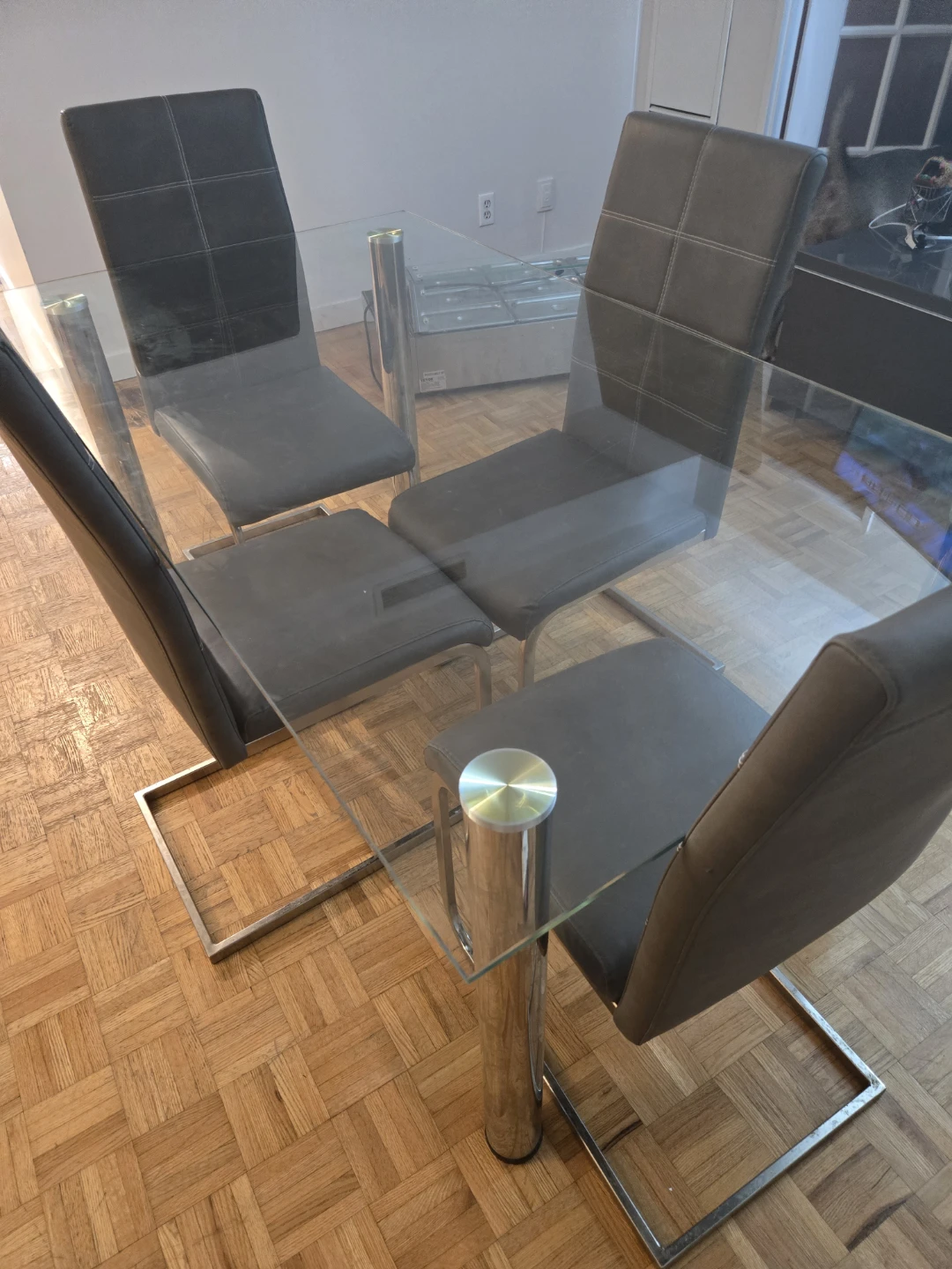 Glass Dining Table with 4 Faux Leather Chairs