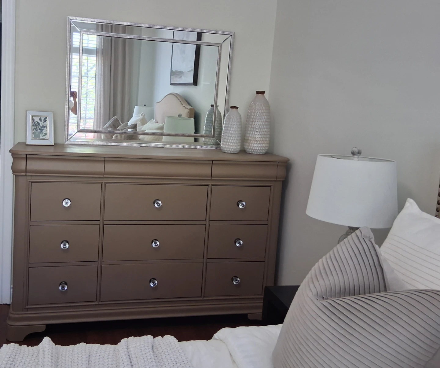 Dresser with 9 drawers and a mirror