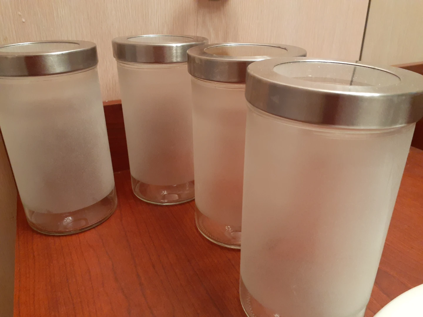 Set of 4 Frosted Glass Canisters with Metal Lids