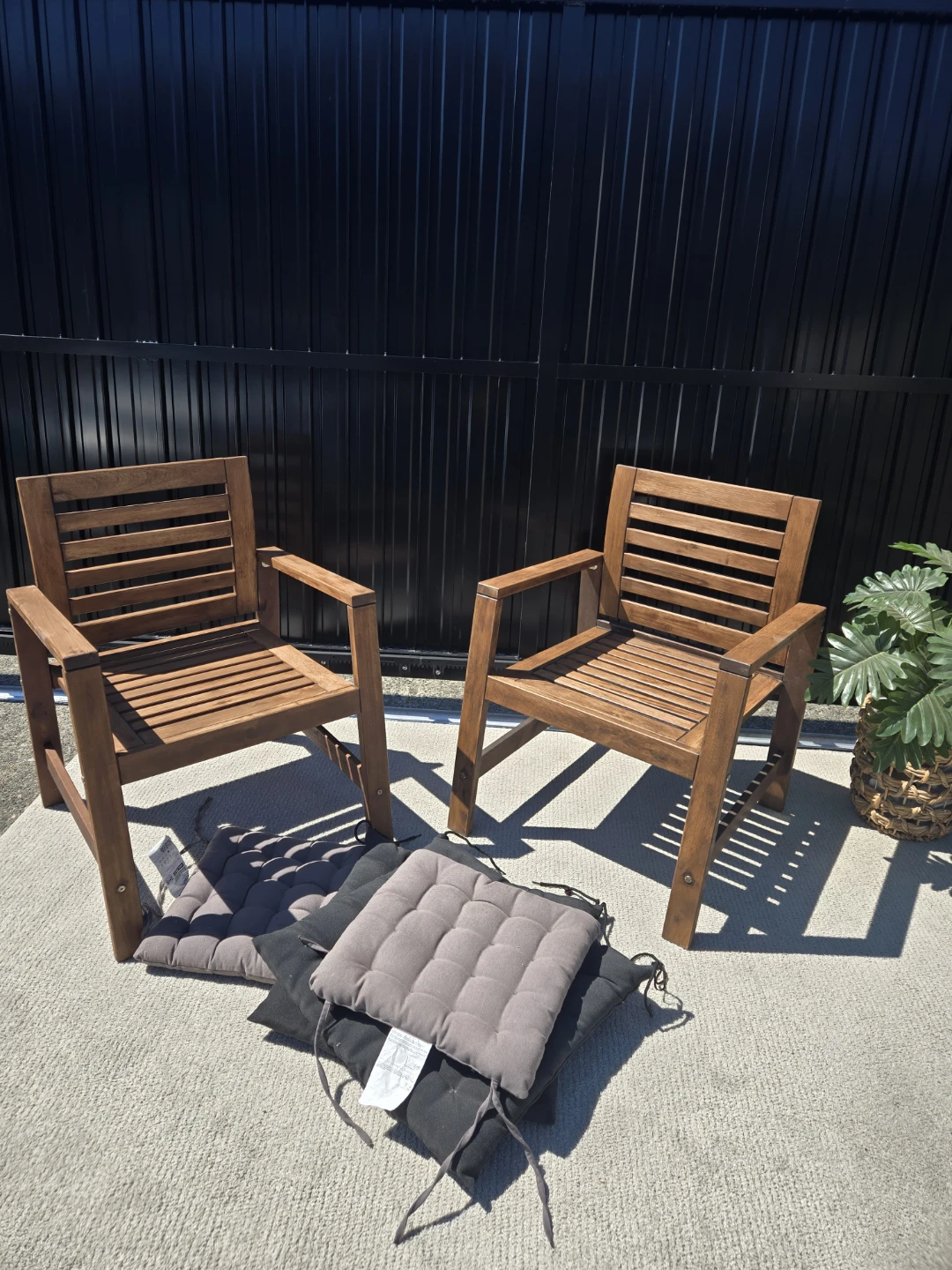 Newly refinished 2 applaro patio chairs w cushions