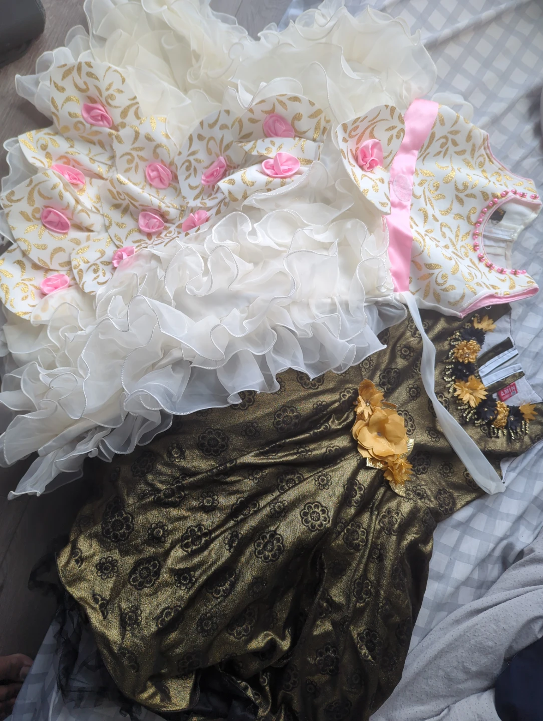 White and Gold Ruffle Dress with Pink Flower Accents