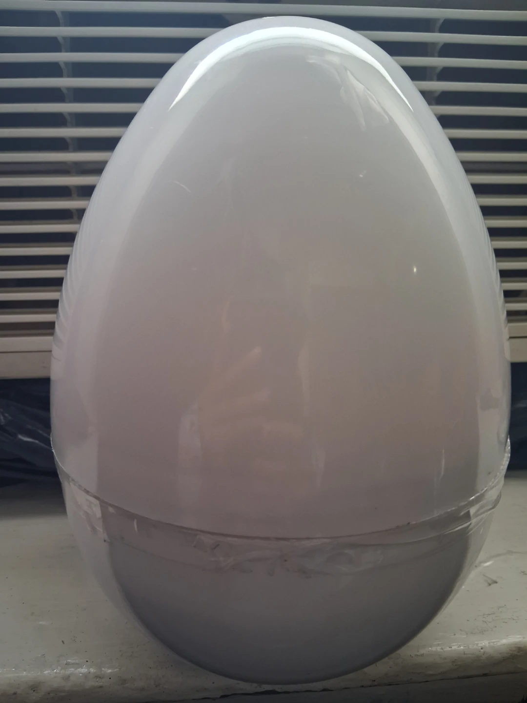 Large White Egg-Shaped Container
