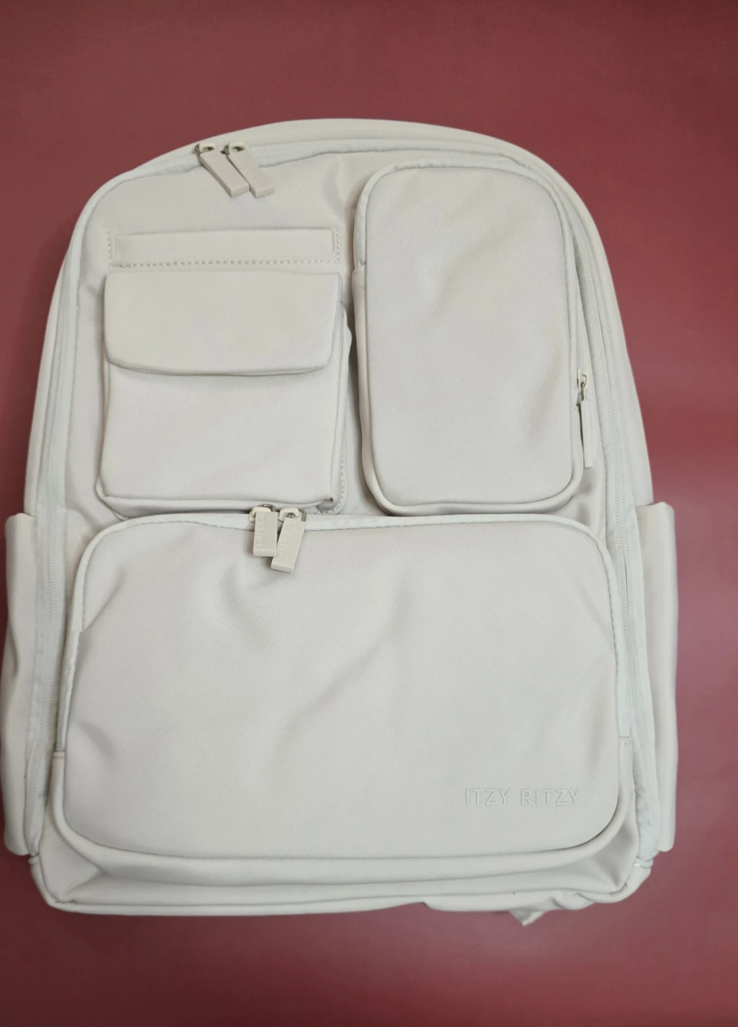 New Itzy Ritzy Cream Backpack diaper bag with changing pad