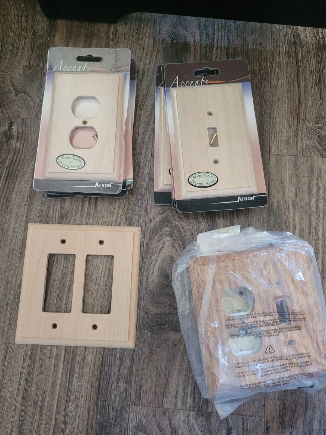 Assorted wooden socket and switch plates