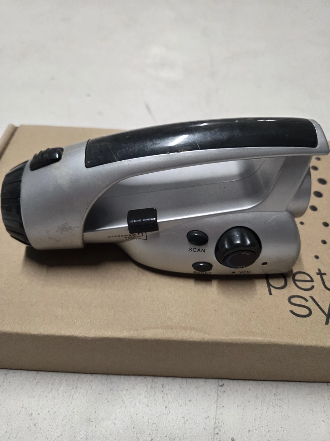 Pettibox System flashlight radio combo