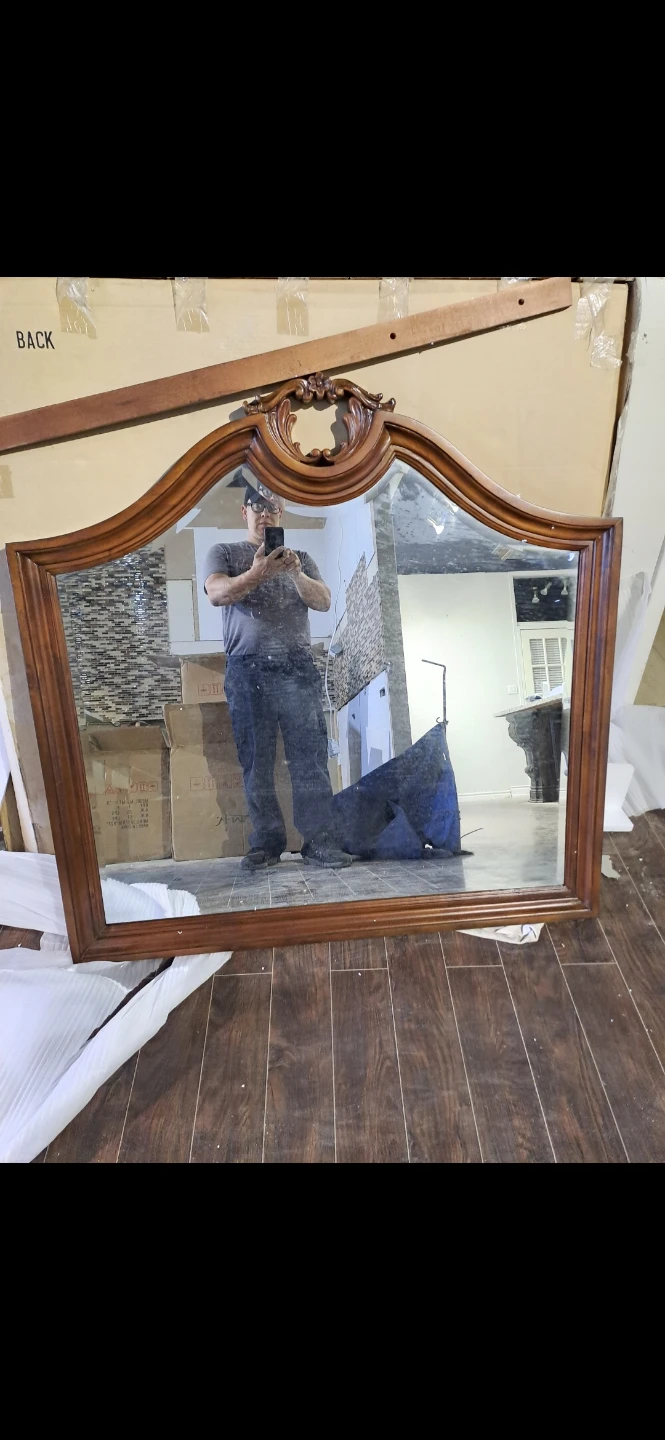 Mirror with wooden frame