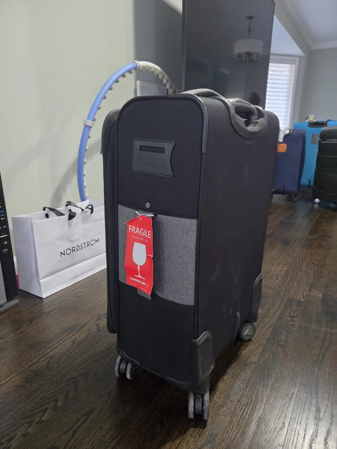 Perry Ellis Portfolio Rolling Suitcase