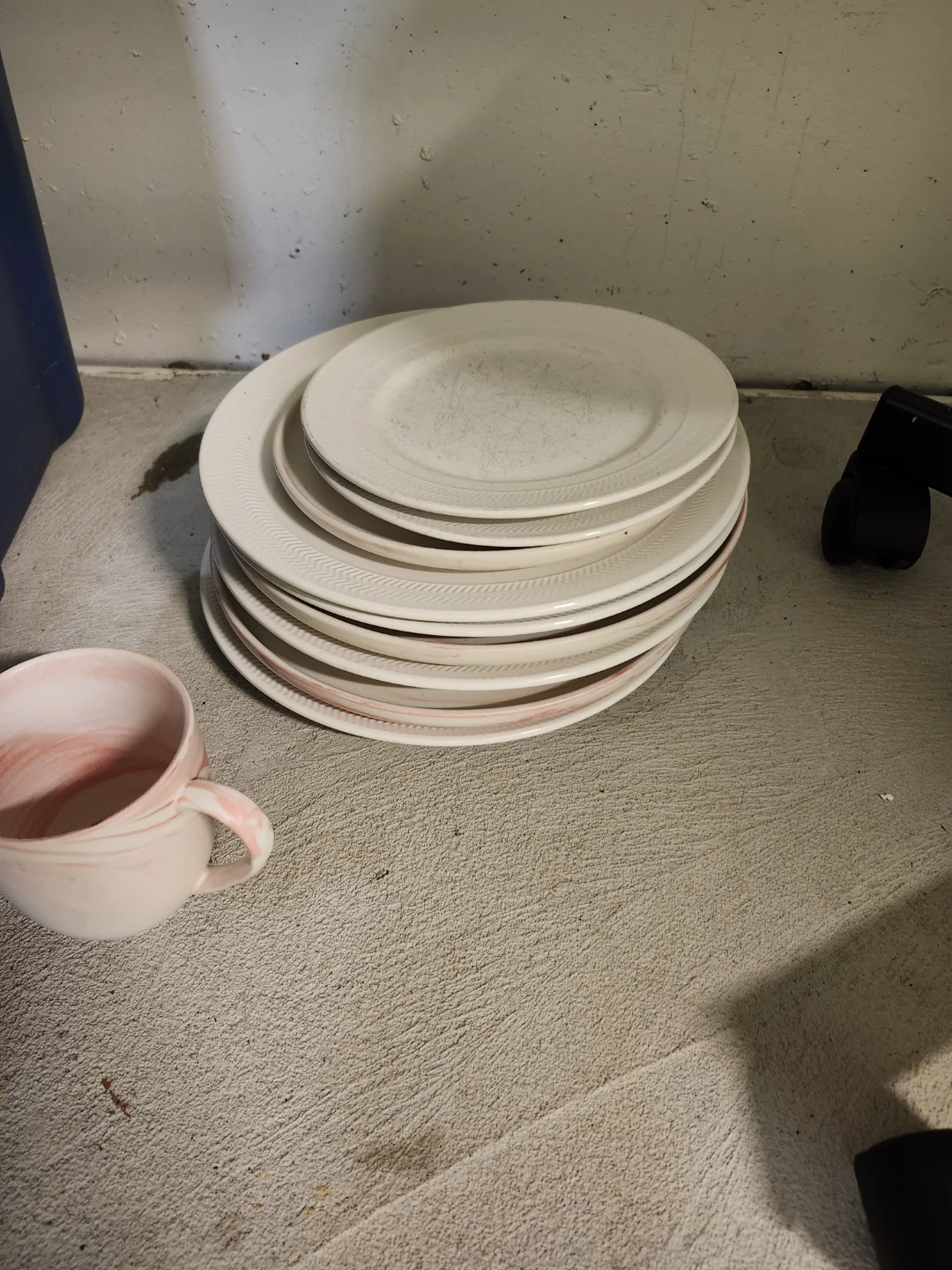 Stack of white dinner plates