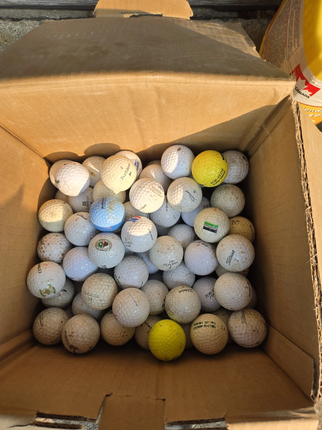 Assorted Golf Balls - Titleist, Maxfli, Top-Flite & More
