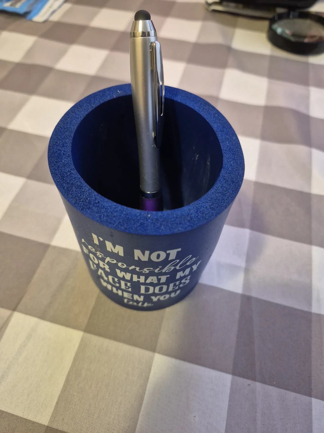 Blue pen holder with funny quote